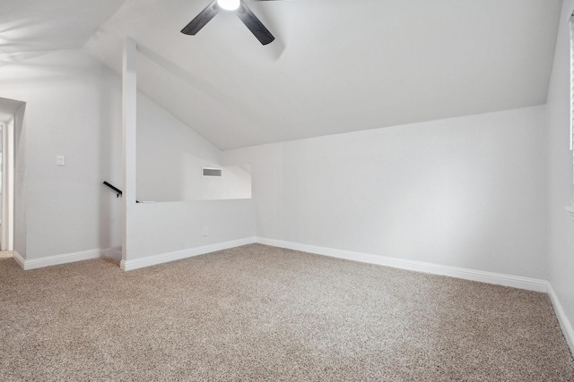 2123 Wheaton Dr, Richardson, TX 75081 - bonus room with lofted ceiling, carpet, ceiling fan, and baseboards