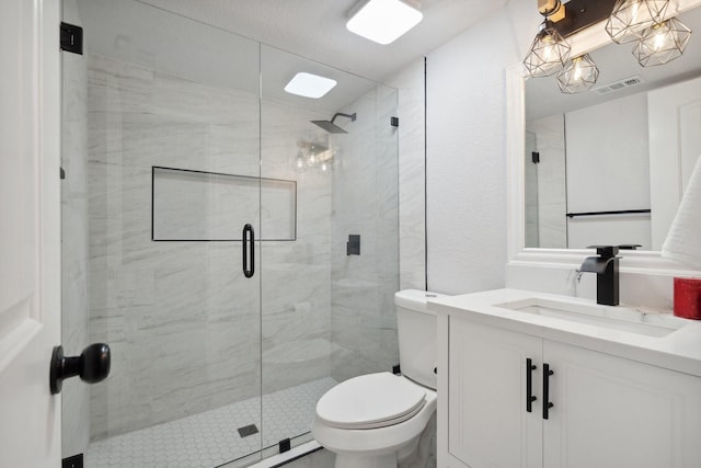 2123 Wheaton Dr, Richardson, TX 75081 - full bathroom with a shower stall, toilet, and vanity
