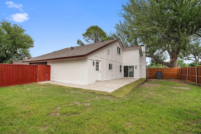 2123 Wheaton Dr, Richardson, TX 75081 - back of house with a patio area, a gate, a shingled roof, and brick siding