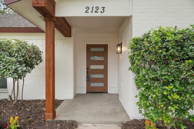2123 Wheaton Dr, Richardson, TX 75081 - doorway to property with brick siding