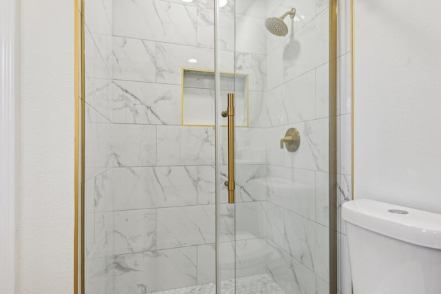 1400 N Floyd Rd, Richardson, TX 75080 - bathroom featuring a shower stall and toilet