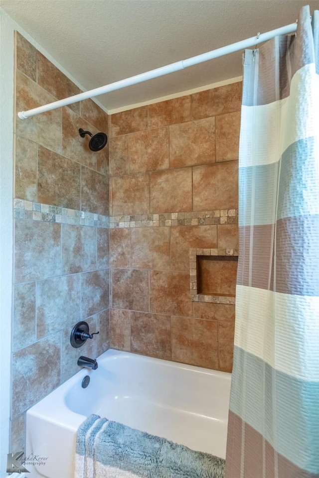 5626 Meadow Dr, Abilene, TX 79606 - bathroom featuring shower / bath combo with shower curtain