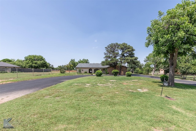 5626 Meadow Dr, Abilene, TX 79606 - ranch-style house with asphalt driveway