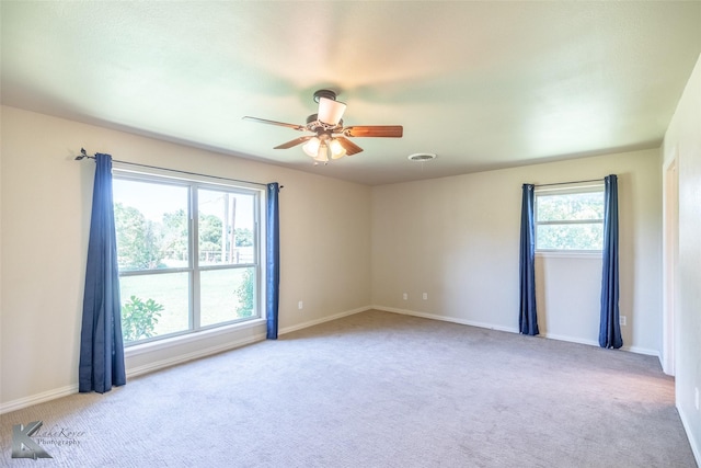 5626 Meadow Dr, Abilene, TX 79606 - empty room with carpet flooring, a ceiling fan, and baseboards