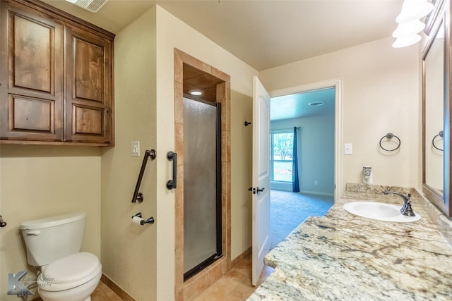 5626 Meadow Dr, Abilene, TX 79606 - bathroom with a shower stall, toilet, baseboards, and vanity