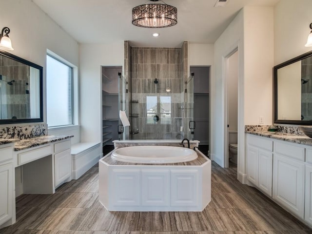 4604 Donna Ln, Parker, TX 75002 - full bath featuring a stall shower, vanity, toilet, a garden tub, and recessed lighting