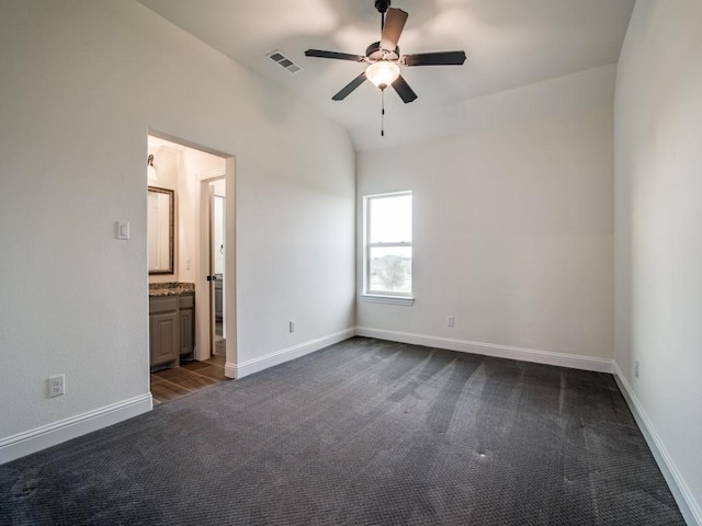 4604 Donna Ln, Parker, TX 75002 - unfurnished bedroom featuring dark colored carpet, baseboards, ensuite bathroom, and a ceiling fan