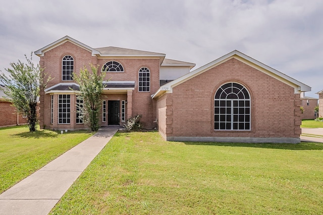 1720 Triumph Trl, Arlington, TX 76002 - traditional-style house featuring brick siding and a front lawn
