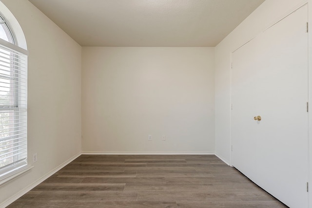 1720 Triumph Trl, Arlington, TX 76002 - empty room featuring wood finished floors and baseboards
