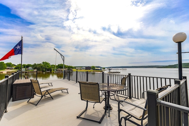8799 County Road 299, Possum Kingdom Lake, TX 76450 - view of patio with a water view