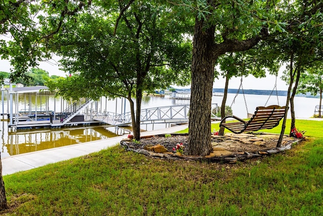 8799 County Road 299, Possum Kingdom Lake, TX 76450 - dock with a water view and a yard