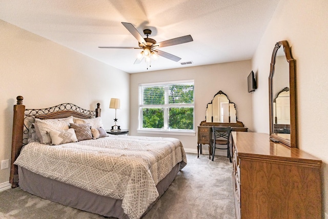 8799 County Road 299, Possum Kingdom Lake, TX 76450 - carpeted bedroom featuring baseboards and a ceiling fan
