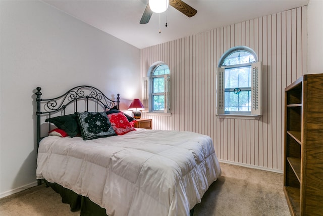 2412 Crestview Cir, Irving, TX 75062 - carpeted bedroom with baseboards and a ceiling fan