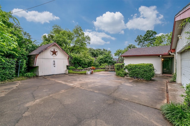 2412 Crestview Cir, Irving, TX 75062 - garage featuring a storage unit