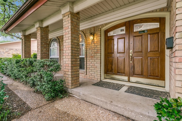 2412 Crestview Cir, Irving, TX 75062 - property entrance with brick siding and covered porch