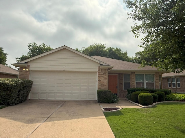 716 Riverhead Dr, Wylie, TX 75098 - ranch-style house featuring brick siding, driveway, a garage, and a front yard