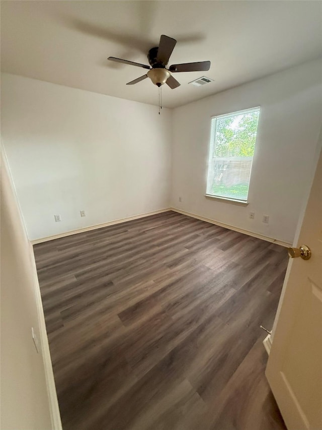716 Riverhead Dr, Wylie, TX 75098 - spare room featuring wood finished floors, ceiling fan, and baseboards