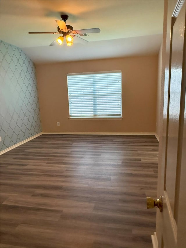 716 Riverhead Dr, Wylie, TX 75098 - empty room featuring wood finished floors, baseboards, ceiling fan, and wallpapered walls