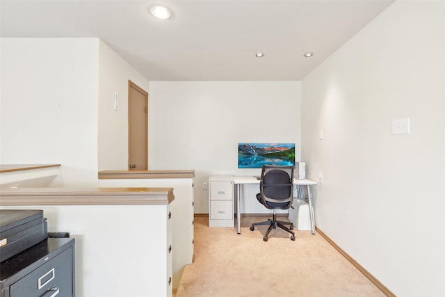 office space with light carpet, recessed lighting, and baseboards