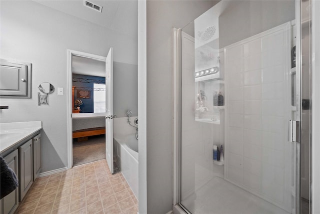 1412 Millbrook Ln, Wylie, TX 75098 - bathroom with ensuite bath, a shower stall, vanity, a bath, and baseboards
