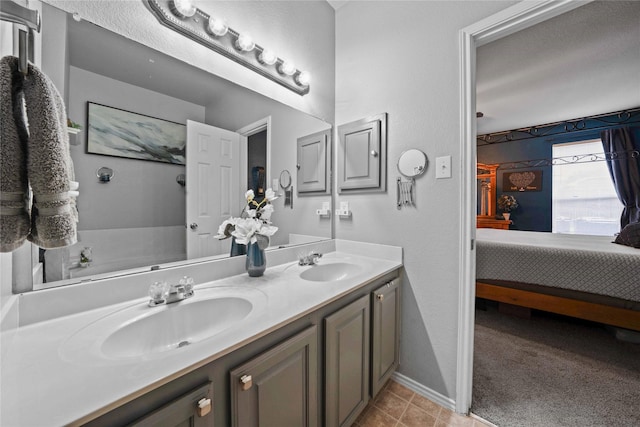 1412 Millbrook Ln, Wylie, TX 75098 - ensuite bathroom with double vanity and tile patterned floors