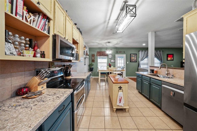 1412 Millbrook Ln, Wylie, TX 75098 - kitchen with appliances with stainless steel finishes, a sink, tasteful backsplash, light tile patterned flooring, and open shelves