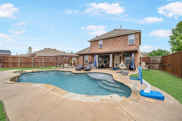 1412 Millbrook Ln, Wylie, TX 75098 - view of swimming pool with a patio, a pergola, and an outdoor living space