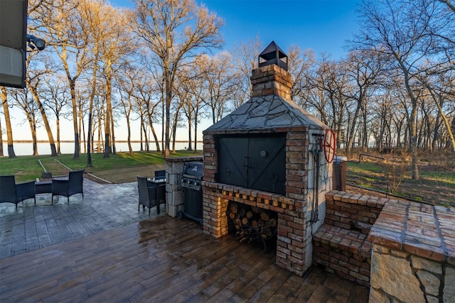 7327 Open Water Pt, Quinlan, TX 75474 - view of patio featuring an outdoor brick fireplace