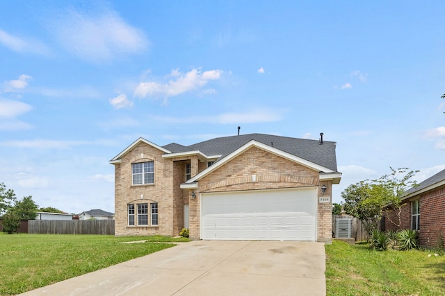 7205 Lake Roberts Way, Arlington, TX 76002 - traditional home with driveway, a garage, a shingled roof, and brick siding