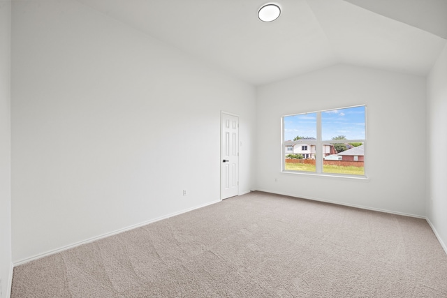 7205 Lake Roberts Way, Arlington, TX 76002 - unfurnished room with lofted ceiling, carpet floors, and baseboards