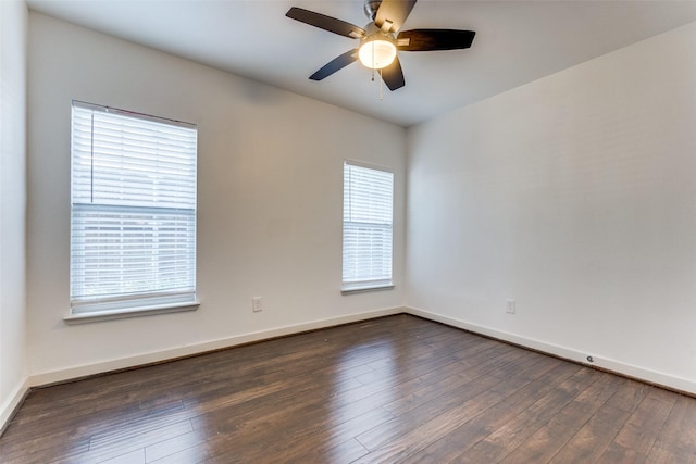 8919 San Fernando Way, Dallas, TX 75218 - empty room with wood finished floors, a ceiling fan, and baseboards