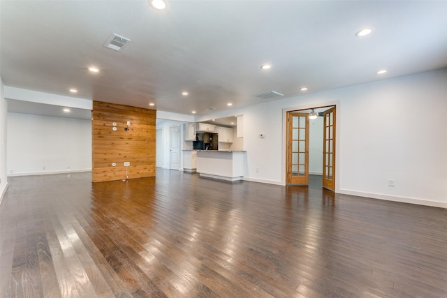 8919 San Fernando Way, Dallas, TX 75218 - unfurnished living room with dark wood-type flooring, recessed lighting, french doors, baseboards, and a ceiling fan