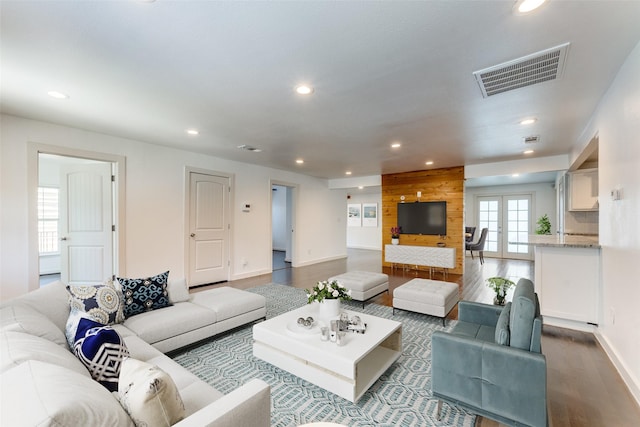 8919 San Fernando Way, Dallas, TX 75218 - living area featuring recessed lighting, dark wood-style floors, baseboards, and french doors