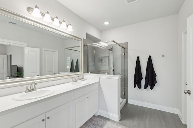 509 Oleander Dr, Royse City, TX 75189 - full bath with a shower stall, double vanity, baseboards, and recessed lighting