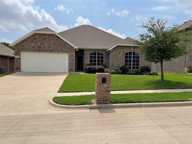 340 Prince John Dr, Saginaw, TX 76179 - view of front facade featuring a garage, a front lawn, concrete driveway, central air condition unit, and brick siding
