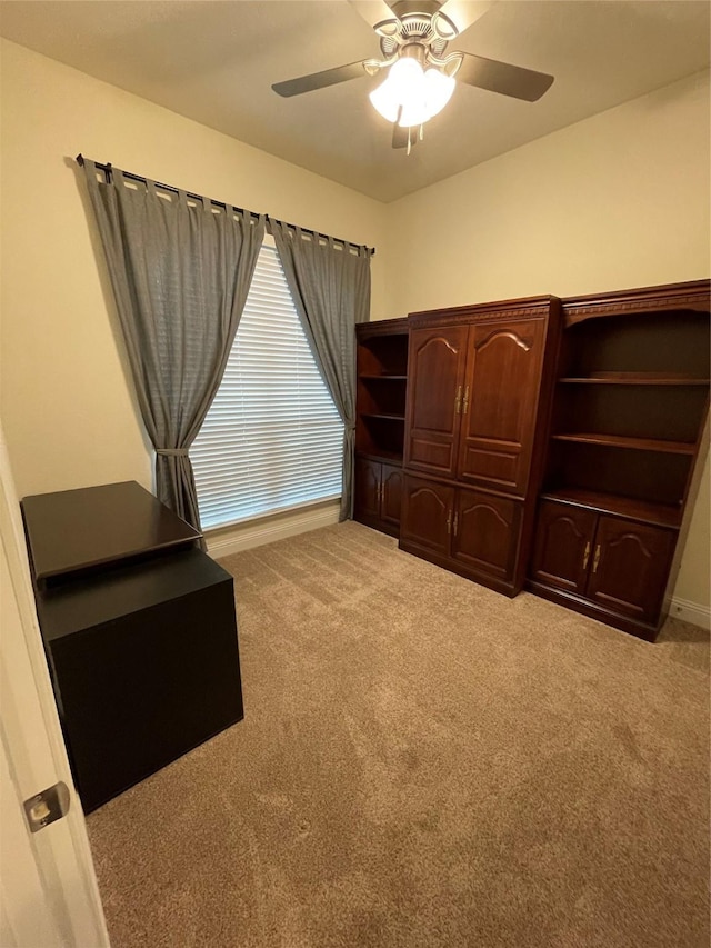 340 Prince John Dr, Saginaw, TX 76179 - unfurnished bedroom with carpet, a ceiling fan, and baseboards