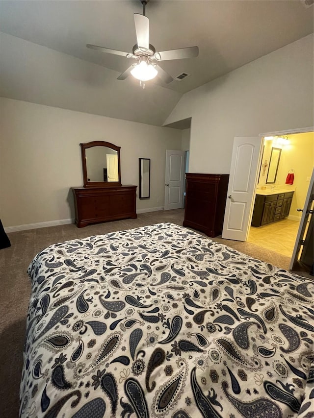 340 Prince John Dr, Saginaw, TX 76179 - bedroom with lofted ceiling, light colored carpet, baseboards, a ceiling fan, and ensuite bathroom