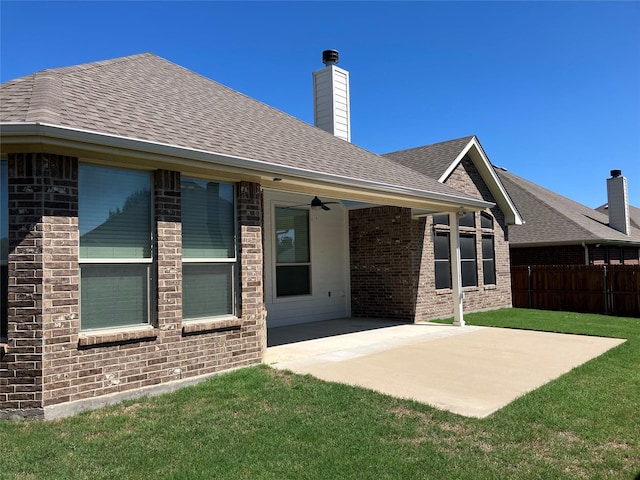 340 Prince John Dr, Saginaw, TX 76179 - back of property with brick siding, a patio, and roof with shingles