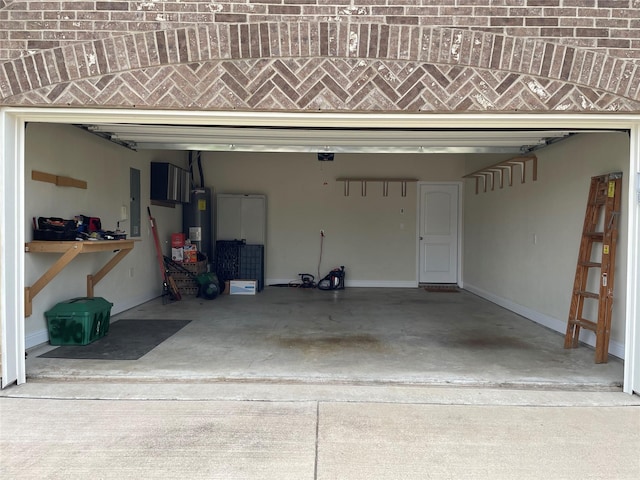 340 Prince John Dr, Saginaw, TX 76179 - garage with baseboards, electric water heater, and a garage door opener