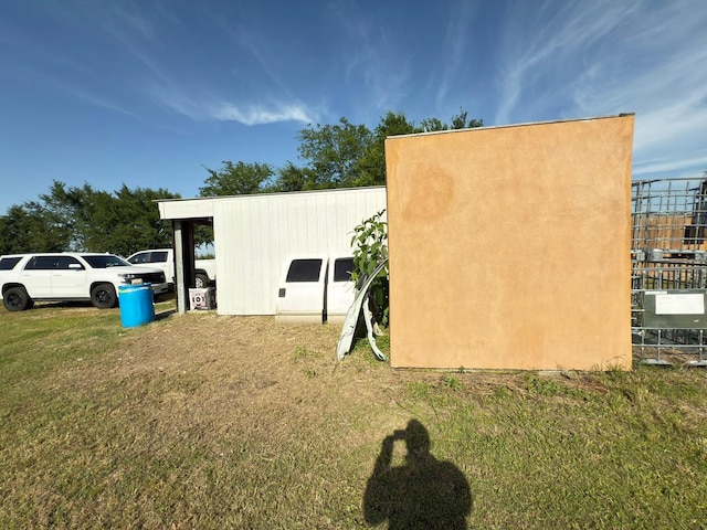 view of home's exterior featuring a yard