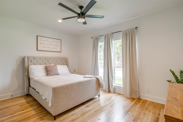 1014 Eagles Ridge Ct, Weatherford, TX 76087 - bedroom with multiple windows, baseboards, light wood-style floors, and recessed lighting