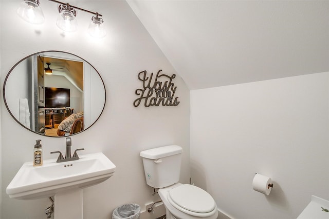 1014 Eagles Ridge Ct, Weatherford, TX 76087 - half bathroom featuring lofted ceiling, toilet, ceiling fan, and a sink