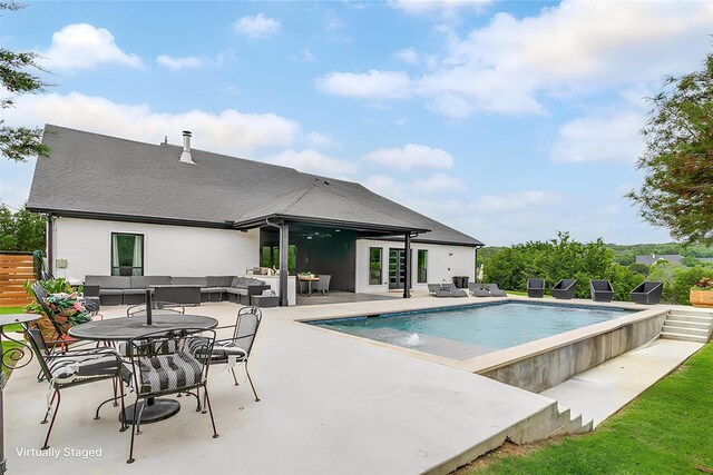 1014 Eagles Ridge Ct, Weatherford, TX 76087 - outdoor pool with an outdoor hangout area, a patio, and french doors