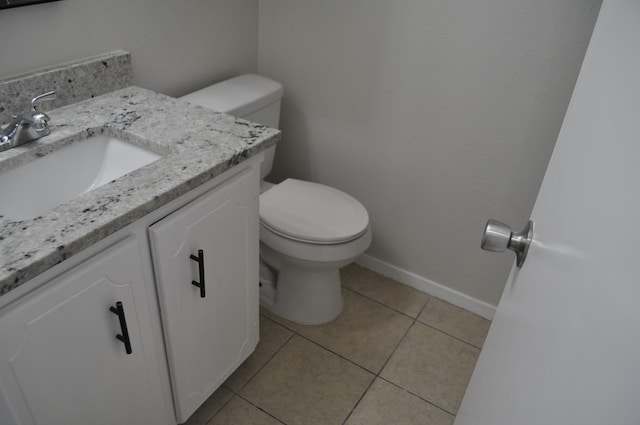 412 Poplar St, Italy, TX 76651 - half bath with vanity, tile patterned flooring, toilet, and baseboards