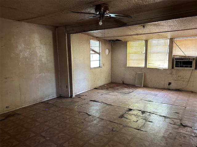 118 County Road 1811, Clifton, TX 76634 - unfurnished room with ceiling fan, tile patterned floors, and cooling unit