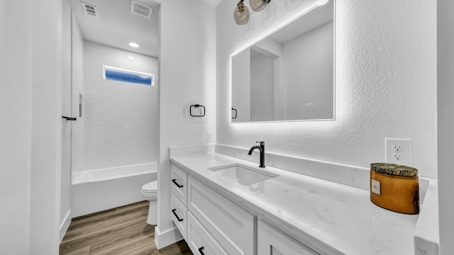 ZEPHYR2TBD Eagles Ridge Dr, Brock, TX 76087 - bathroom featuring vanity, wood finished floors, toilet, and a textured wall