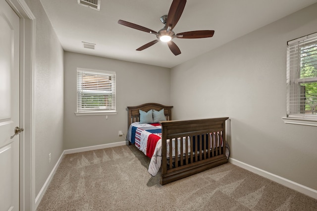 7313 Jo Will St, Colleyville, TX 76034 - carpeted bedroom with multiple windows, baseboards, and a ceiling fan
