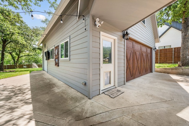 7313 Jo Will St, Colleyville, TX 76034 - view of side of property featuring a garage and concrete driveway