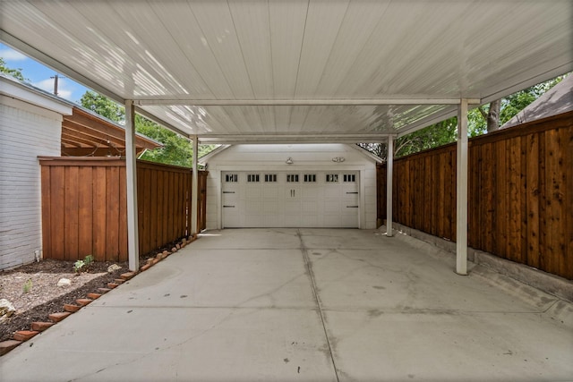 4233 Pershing Ave, Fort Worth, TX 76107 - view of patio / terrace featuring an outdoor structure, a garage, and a carport
