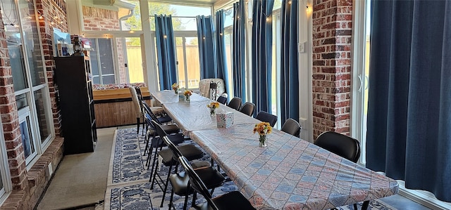 104 Olives Br, Shady Shores, TX 76208 - dining area featuring brick wall